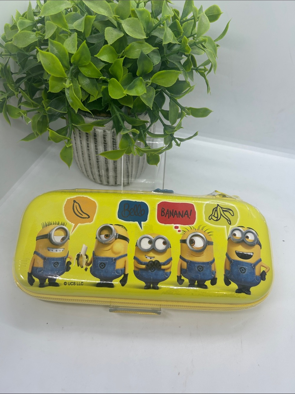 Yellow Minions character zippered pencil case  graphics of various Minions.NWT